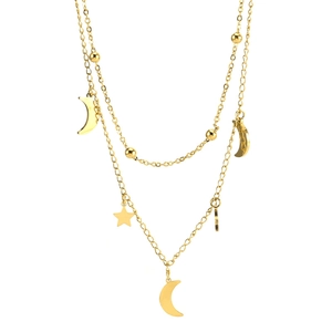 Detail of double-layer gold necklace with crescent moon and star charms on fine chain