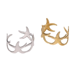 Starfish open bangles in gold and silver finish with textured metallic surface