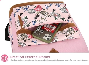 Detail of pink floral canvas backpack with suede puller and exterior zipper pocket