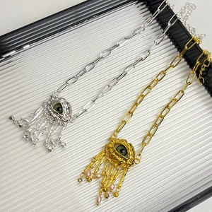 Vintage metal devil eye necklace with pearl tassel and paperclip chain in gold and silver