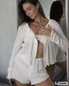 Detailed knit texture and ruffle trim on white three-piece loungewear set for women
