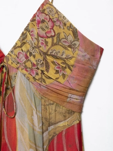 Detailed view of bohemian floral chiffon midi dress with fine pleats and vibrant prints