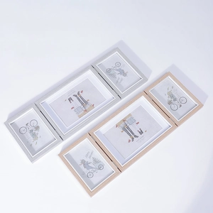 Three-fold foldable Nordic wooden photo frame set in light grey and natural wood finish