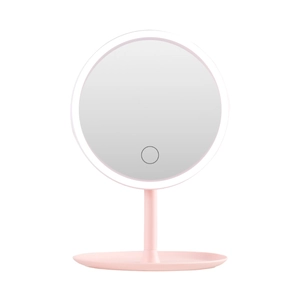 Pink LED desktop makeup mirror with touch sensor and storage base on white background