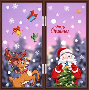 Detailed Christmas static stickers featuring Santa Claus and reindeer on a double window display