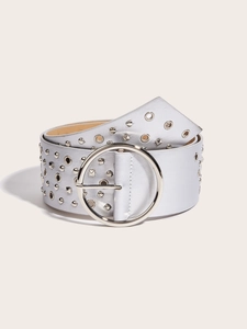 Detail of silver faux leather wide belt with vintage metal studs and round eyelets