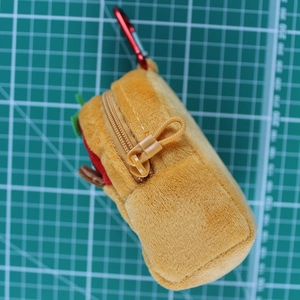 Plush Capybara hamburger shaped coin purse with zipper closure and red carabiner