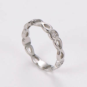 Detail of infinity loop silver ring featuring sparkling pavé set cubic zirconia