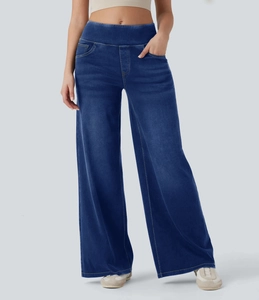 Detail der hoch taillierten Wide Leg Jeans in Dunkelblau mit hochwertigem Metallreißverschluss