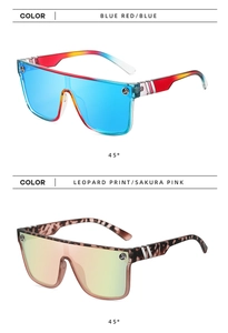Detail view of large rimless sunglasses in blue red and leopard print frames