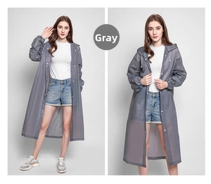 Detail view of grey semi-transparent EVA raincoat with hood and elasticated cuffs