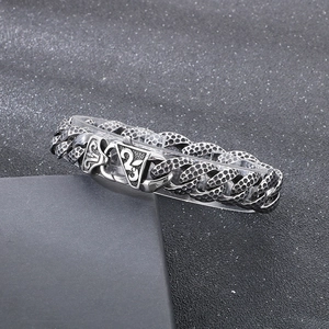Detailed close-up of 18mm hammered texture Cuban link bracelet in vintage stainless steel