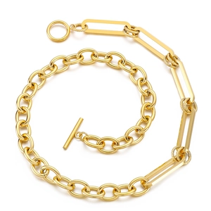 Golden stainless steel chain necklace with OT buckle and mixed links on white background