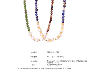 Detail showing titanium steel necklaces with freshwater pearls and turquoise stones