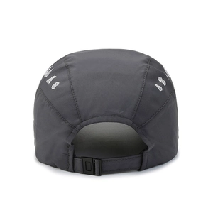 Back view of a dark grey quick-dry baseball cap with USA dot pattern and adjustable buckle