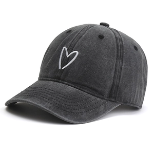 Classic washed denim baseball cap in dark grey with minimalist white heart embroidery
