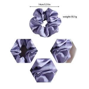 Purple satin silk scrunchie with 14cm diameter and 18.1g weight on white background