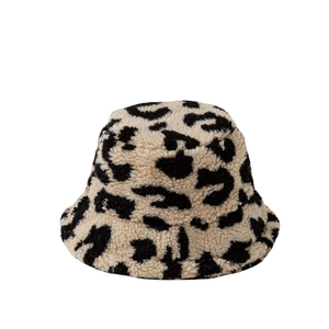 Winter faux fur leopard print bucket hat with warm plush texture and classic round top design