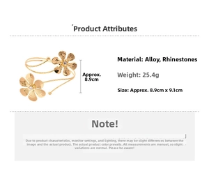 Detail view of gold flower open arm cuff with rhinestones and size specifications
