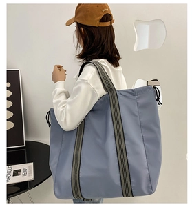 Large capacity oxford cloth travel shoulder bag for casual outdoor use with dual straps.