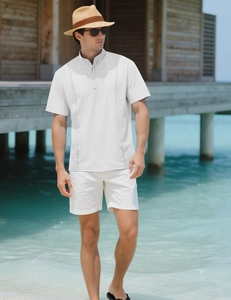 Close-up of white short-sleeve Henley shirt with cotton linen texture for beach vacations
