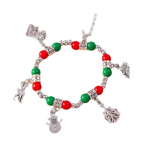 Christmas beaded bracelet with red and green charms like snowflakes and bells