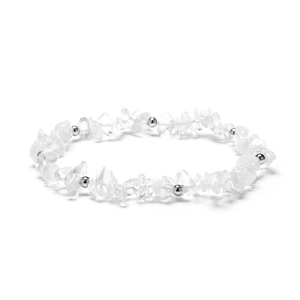 Macro detail of natural clear crystal fragments with small silver beads on a beaded bracelet