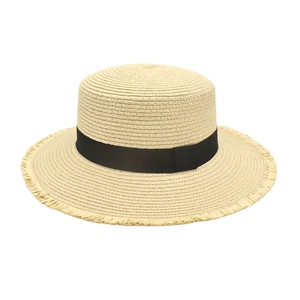 Women's foldable straw sun hat with wide brim, black ribbon, and fringe details
