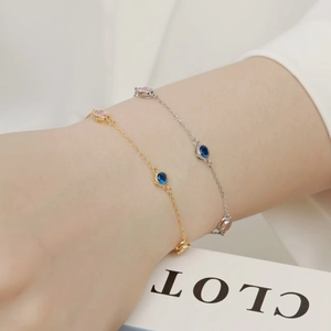 S925 sterling silver rainbow zircon bracelet set in gold and silver finish on wrist