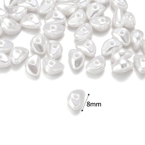 Detail view of 8mm irregular white ABS pearl beads for handmade jewelry DIY projects