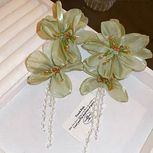 Elegant sage green fabric flower earrings with long crystal tassels in French retro style