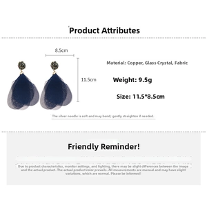 Detail view of navy blue lace petal tassel earrings with copper and crystal beads