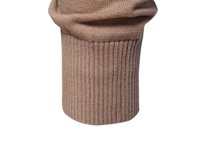 Close-up of ribbed knit cuffs on men's half-zip sweater in khaki color fabric