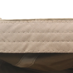 Detailed close-up of khaki cotton golf hat with triple-row stitching for durability