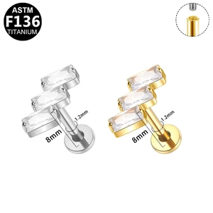 G23 titanium labret stud with baguette zircon and internal thread structure details