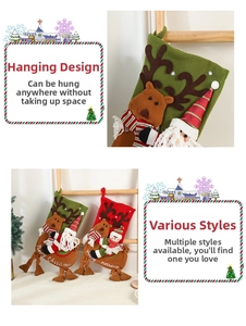 Detail of plush Christmas stockings with 3D reindeer design and hanging loops