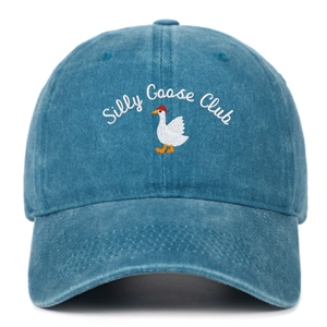 Detail of Silly Goose Club embroidery on vintage washed blue denim baseball cap