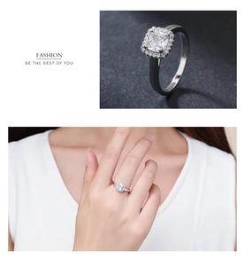 Macro view of cushion halo ring with square zircon and model hand wearing demonstration