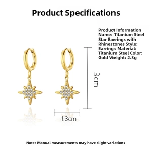 Macro shot of gold titanium star earrings featuring intricate diamond-like zircon settings