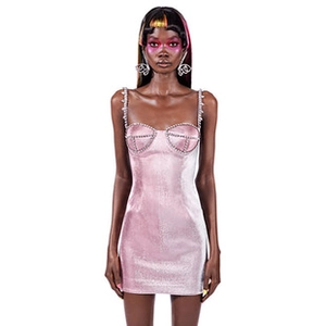 Detail of pink sequin bustier dress with thin straps and sparkling rhinestone accents