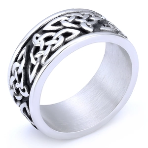 Detailed view of silver Viking ring with Celtic Knot carving and brushed inner finish