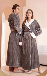 Detail of grey flannel robe with plush white fleece lining and vertical striped texture