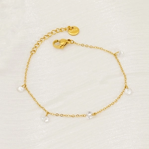 Elegant gold-plated stainless steel chain bracelet featuring five faceted zircon crystals