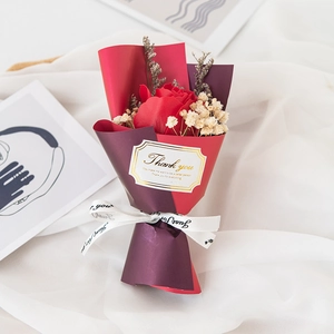 Mini soap flower bouquet with red rose and sunflower in purple wrap for gift giving