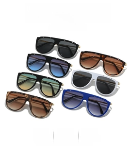 Flat top oversized sunglasses with metal rivets in various frame colors for outdoor fashion