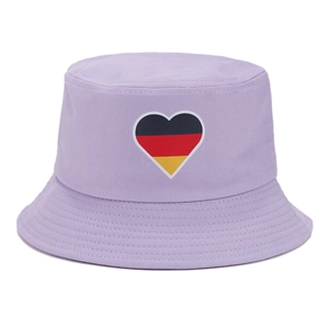 Detail of a light purple bucket hat featuring a heart-shaped German flag patch and fine stitching