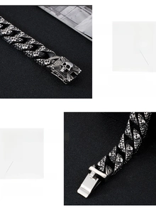 Detailed macro view of retro skull punk bracelet with intricate scale chain patterns