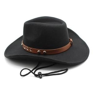 Detail of black wool cowboy hat with brown leather belt and metallic studs