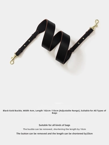 Adjustable black leather bag strap with gold metal hooks and 4cm width detail