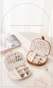 Close-up of double-layer PU leather jewelry box with earring plate and ring slots
